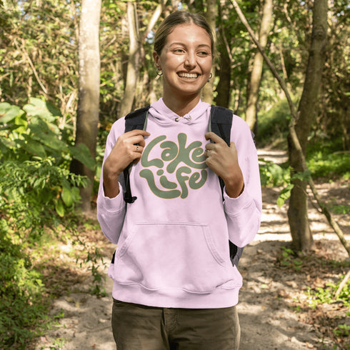 Embrace the serene vibe of lakeside living with our "Lake Life" Hoodie, a perfect blend of comfort and nostalgia. Crafted with a nod to the laid-back, timeless appeal of lake life, this hoodie features the phrase "Lake Life" prominently displayed in a charming retro font that evokes memories of sunny days spent by the water, laughter-filled evenings around campfires, and the soothing tranquility of nature.